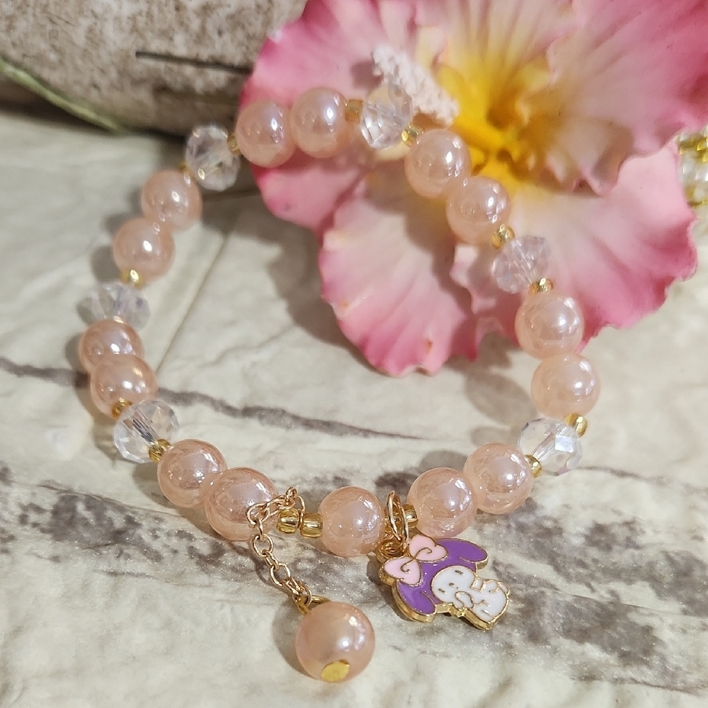 Handmade Elegant Pink Beaded Bracelet with Gold Accents